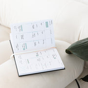 2024 diary planner open on couch by Ronnie & Co